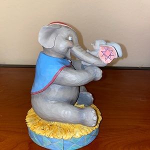 A beautiful wooden carved Dumbo’s mother and dumbo